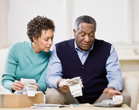 Couple looking at receipts