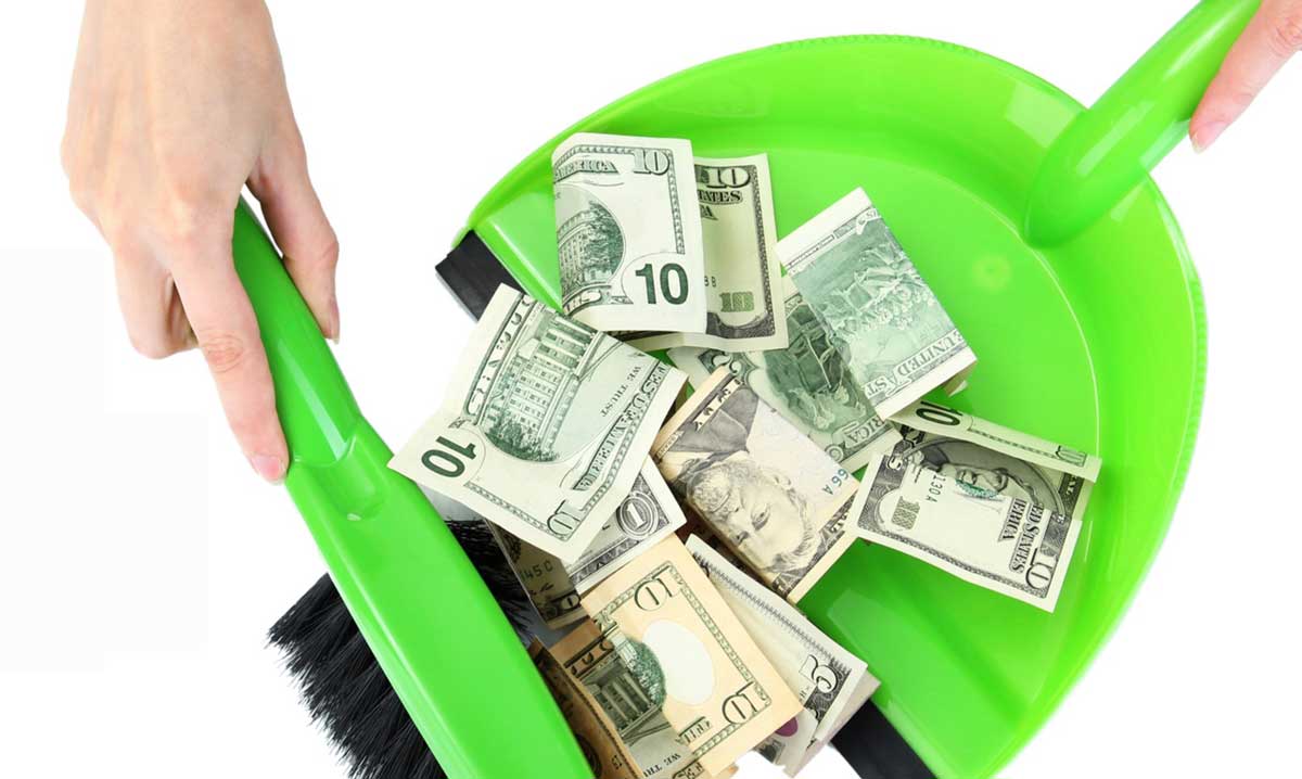 money in dustpan