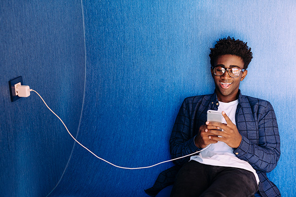 person charging phone